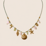 collier océanique doré coquillage et étoiles
