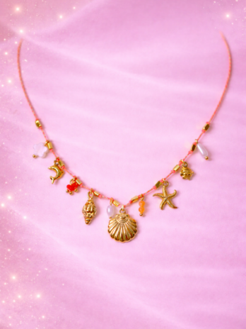collier océanique doré coquillage et étoiles